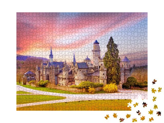 Puzzle 1000 Teile „Landschaft mit mittelalterlicher Löwenburg im Schlosspark Wilhelmshöhe, Kassel“