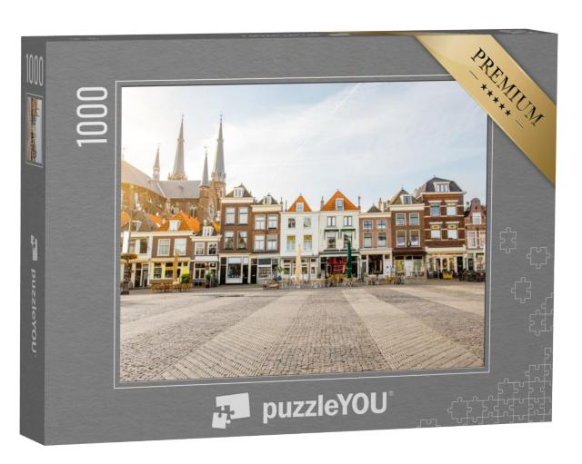 Puzzel 1000 stukjes „Zicht op de prachtige gevels en de kerk op het centrale plein in Delft“