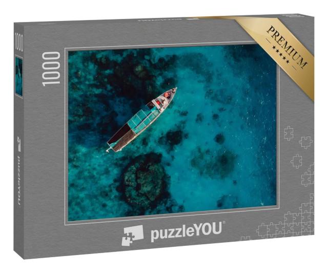 Puzzle 1000 Teile „Vogelperspektive: Tourboot im blauen Ozean“