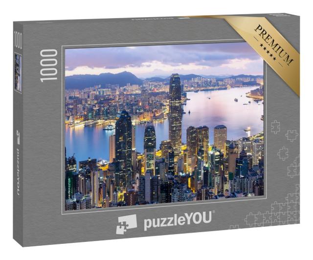 Puzzle 1000 Teile „Sonnenaufgang über dem hell erleuchteten Hongkong“