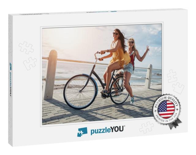 Two Stylish Young Female Friends on a Bicycle Along Seasi... Jigsaw Puzzle