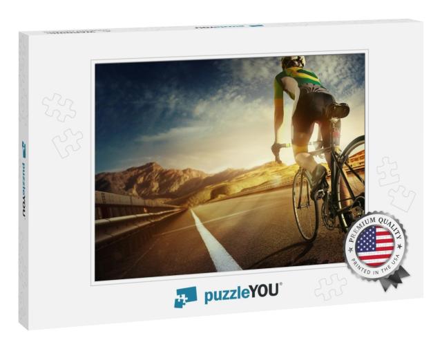 Cyclist Riding a Bike on an Open Road to the Sunset... Jigsaw Puzzle