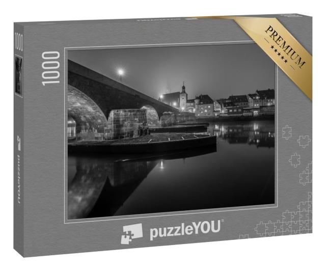 Puzzle 1000 Teile „Blick auf die Steinbrücke in Regensburg bei Nacht“