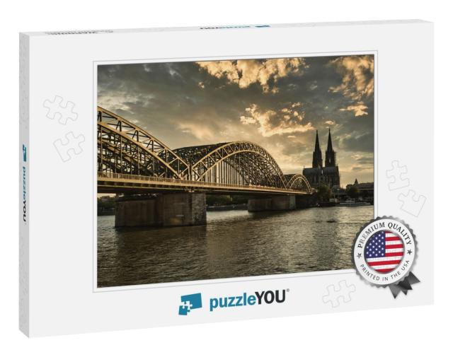 Cologne Cathedral At Sunset with River Rhine & Famous Hoh... Jigsaw Puzzle