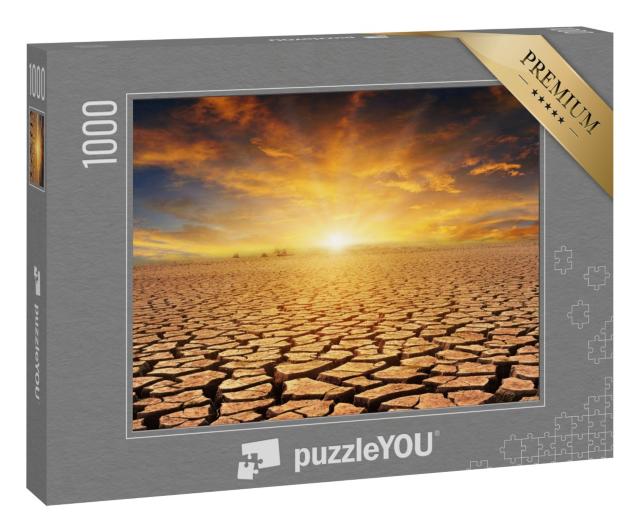 Puzzle 1000 Teile „Orangefarbener bewölkter Sonnenuntergang über Steinwüste“