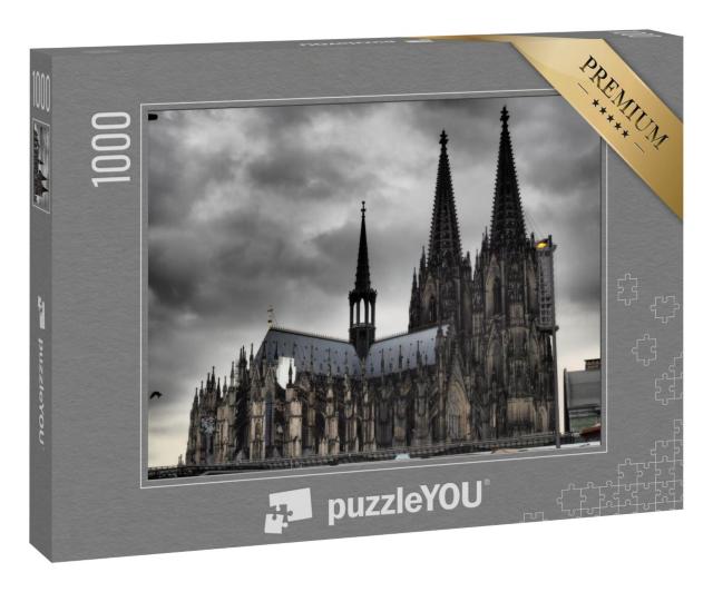 Puzzle 1000 Teile „Kölner Dom unter dunkeln Wolken“