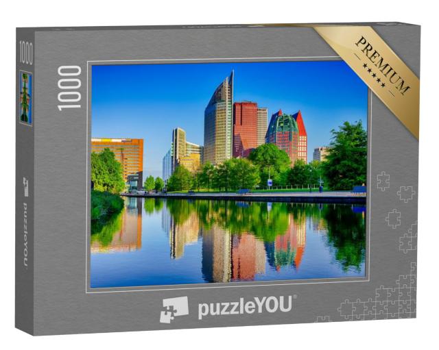 Puzzel 1000 stukjes „De skyline van wolkenkrabbers in Den Haag op het blauwe uur in Nederland“