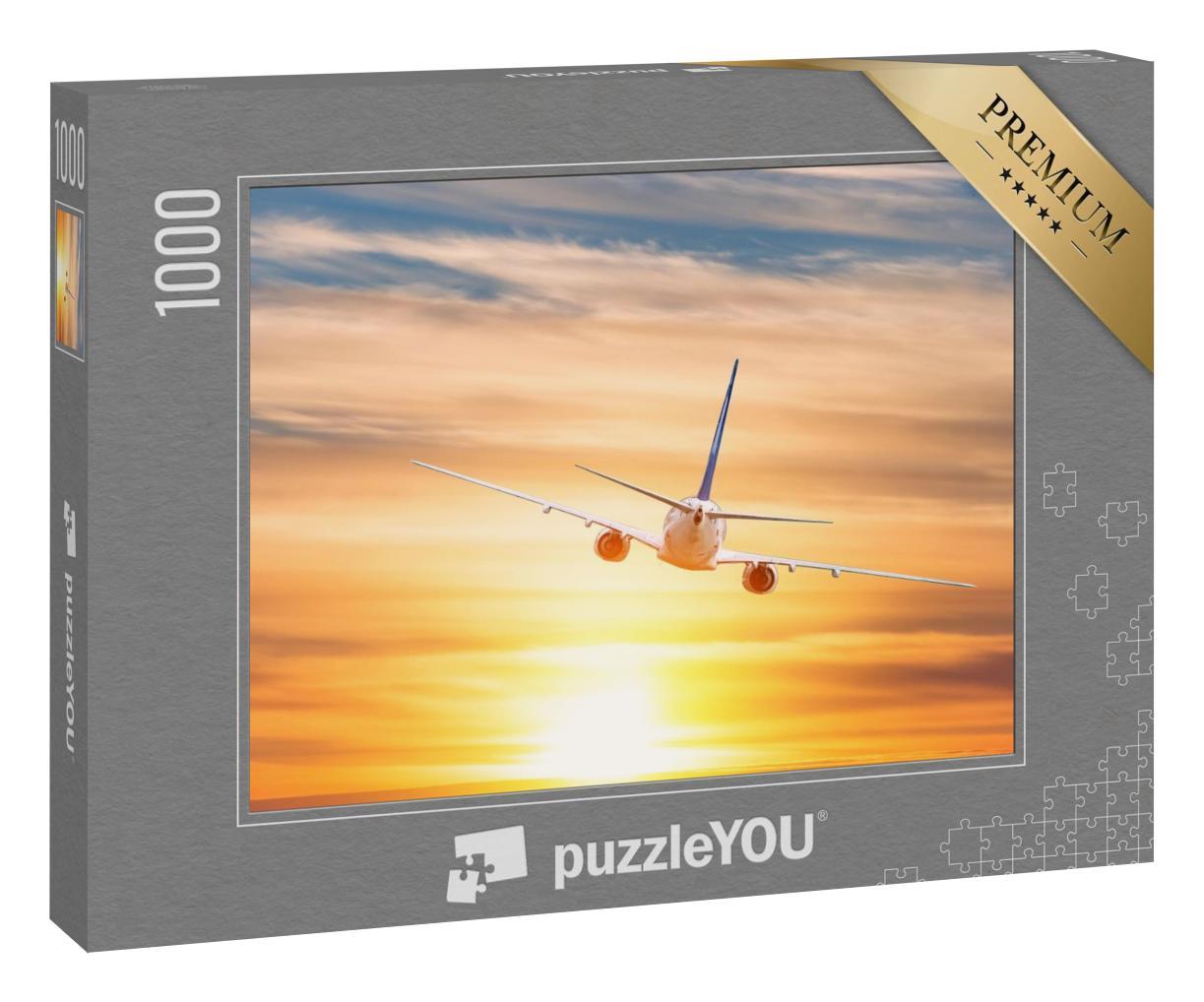 Puzzle 1000 Teile „Flugzeug beim Flug in den Sonnenuntergang“
