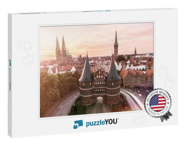The Holsten Gate in the Hanseatic City of Lubeck At Sunri... Jigsaw Puzzle