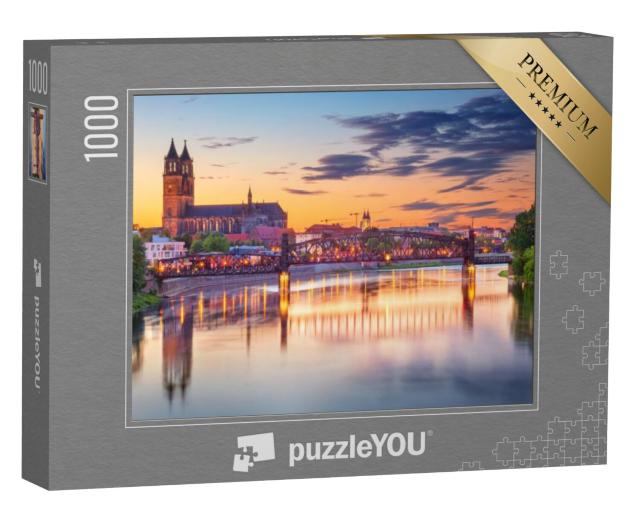 Puzzel 1000 stukjes „Stadsgezicht van Magdeburg met de Elbe bij zonsondergang, Duitsland“