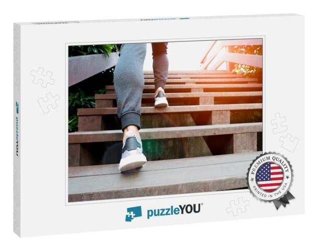 A Man Step Up to Success, Sport Man is Climbing on Wooden... Jigsaw Puzzle