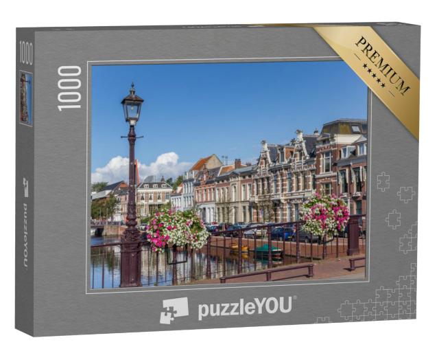 Puzzel 1000 stukjes „Brug met bloemen in het historische centrum van Haarlem, Nederland“