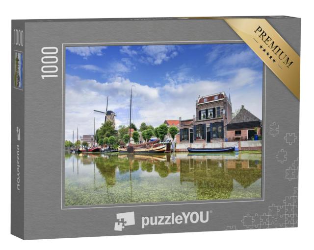 Puzzel 1000 stukjes „Oude binnenstad van Gouda met groene gracht“