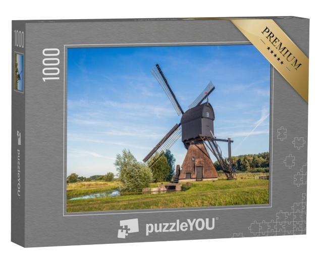 Puzzel 1000 stukjes „poldermolen Noordeveldse Molen in het dorp Dussen, Noord-Brabant“