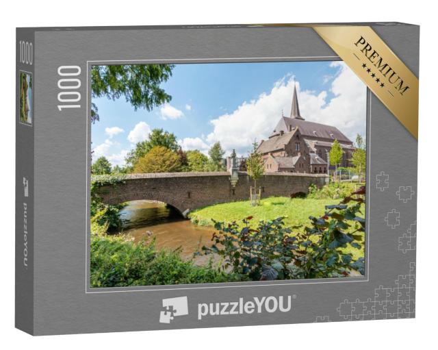 Puzzel 1000 stukjes „Stenen brug over de Schwalm in Swalmen met uitzicht op St. Lamb“