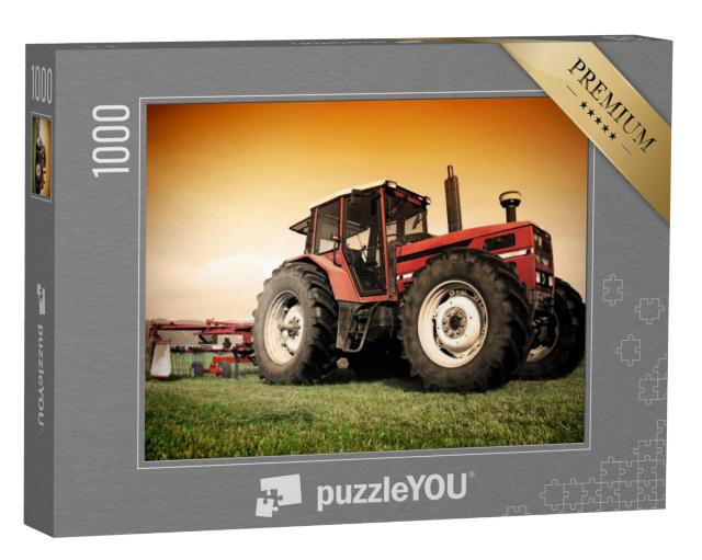 Puzzel 1000 stukjes „Oude rode tractor op de weide tijdens maaiwerkzaamheden“