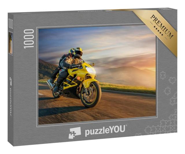 Puzzle 1000 Teile „Motorradfahrer auf der Fahrt in den Sonnenuntergang“