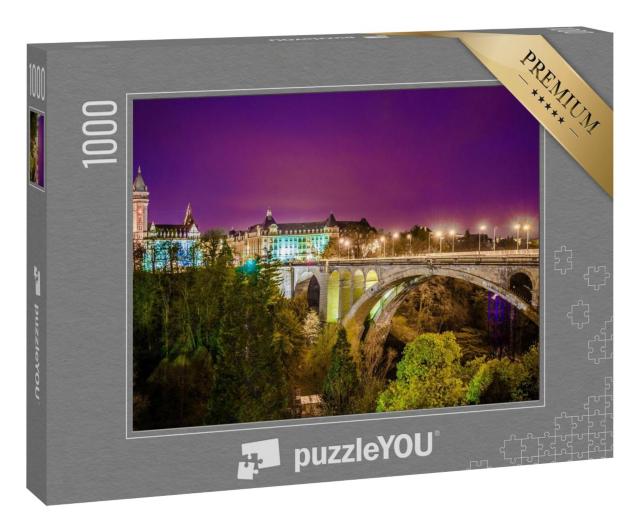 Puzzle 1000 Teile „Nachtansicht über der Brücke zum Place de Metz, Luxemburg“