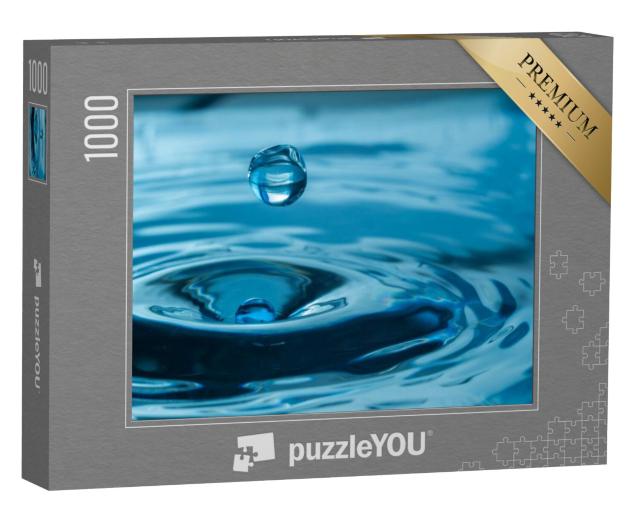 Puzzel 1000 stukjes „Waterdruppels spatten in een glas“