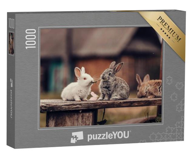 Puzzel 1000 stukjes „Twee konijnen knabbelen op paardenbloemen“