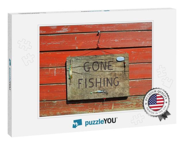 Gone Fishing Sign Written on a Wooden Plaque Hanging on a... Jigsaw Puzzle