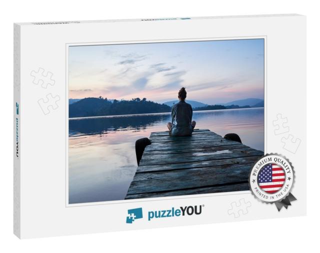 Peaceful Lifestyle Shot of Woman Sitting on Dock At Sunse... Jigsaw Puzzle