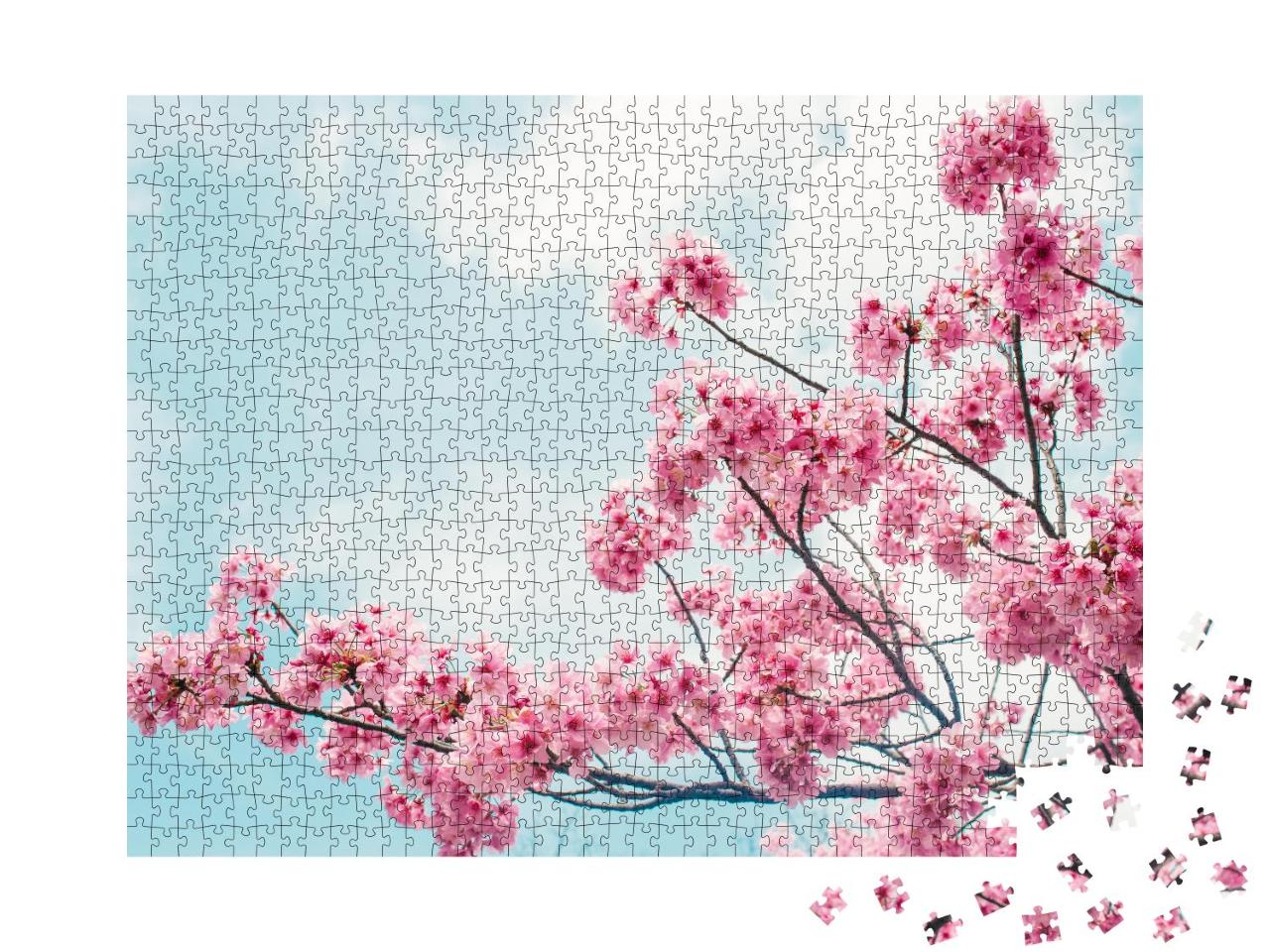 Puzzle 1000 Teile „Bezaubernde blühende Kirschzweige unter blauem Himmel“