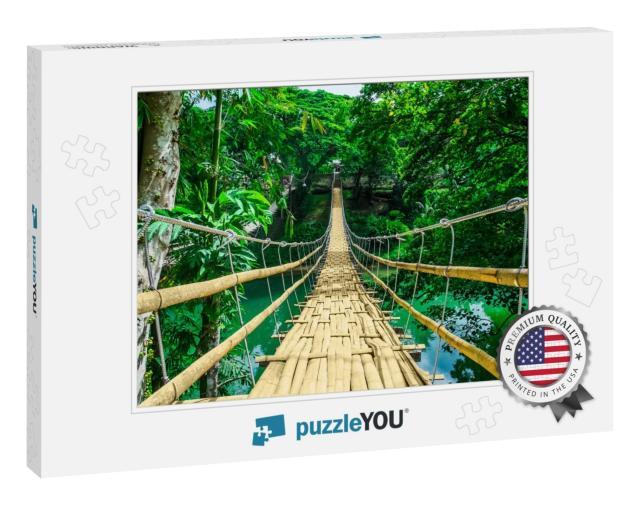 Bamboo Pedestrian Hanging Bridge Over River in Tropical F... Jigsaw Puzzle