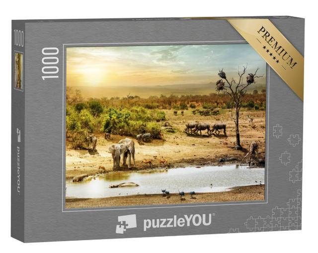 Puzzel 1000 stukjes „Dieren bij de waterpoel in de Zuid-Afrikaanse woestijn bij zonsondergang“