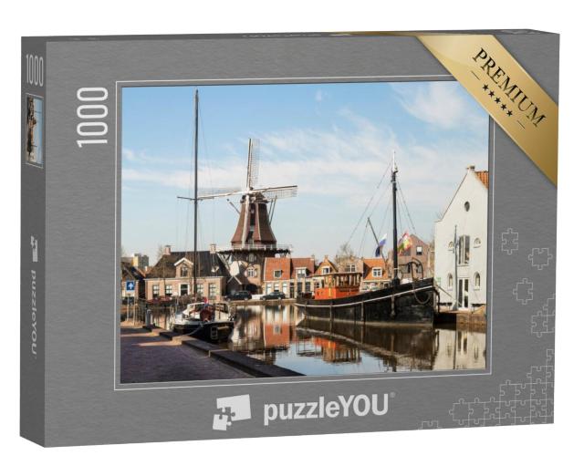 Puzzel 1000 stukjes „Windmolen langs de gracht in het centrum van Meppel.“