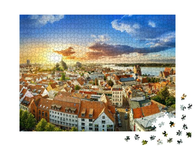 Puzzle 1000 Teile „Innenstadt von Rostock bei Sonnenuntergang, Deutschland“