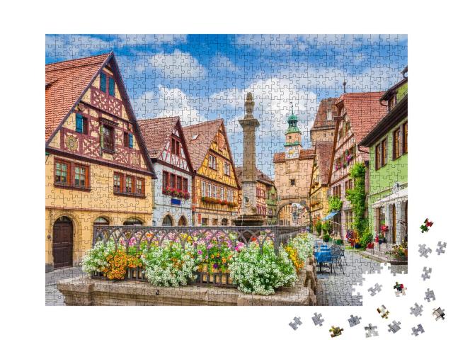 Puzzle 1000 Teile „Rothenburg ob der Tauber an sonnigem Tag mit blauem Himmel“
