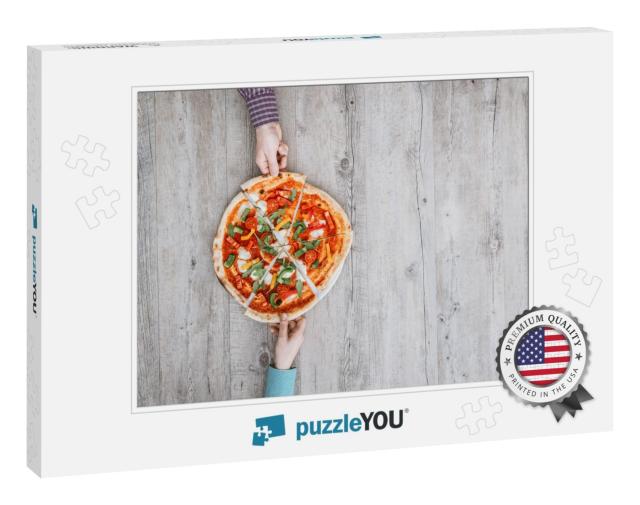Friends Sharing a Delicious Pizza on a Rustic Table, They... Jigsaw Puzzle