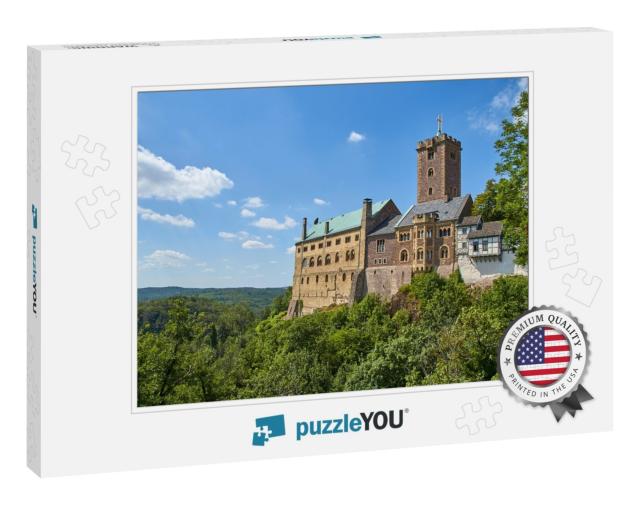 The Wartburg Castle on a Hill Covered in Greenery Under a... Jigsaw Puzzle