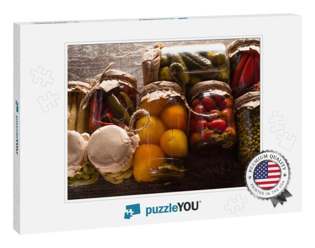 Top View of Delicious Pickles in Jars on Wooden Ta... Jigsaw Puzzle
