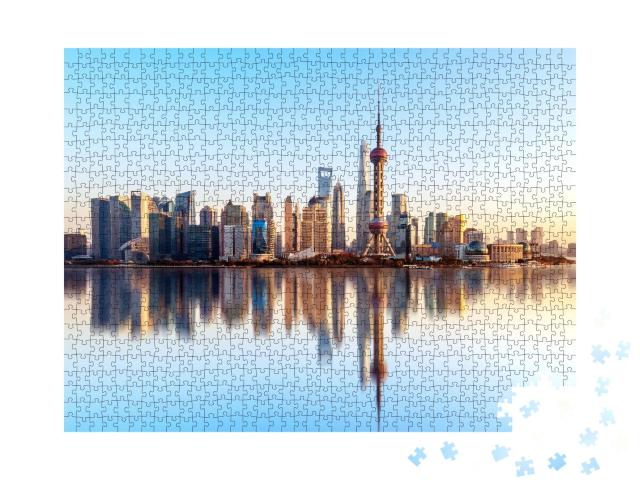 Puzzle 1000 Teile „Skyline von Shanghai mit perfekter Wasserreflektion“
