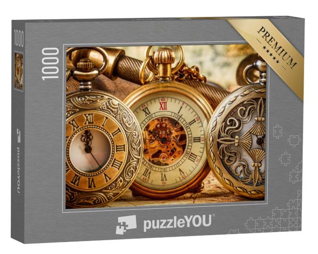 Puzzel 1000 stukjes „Drie antieke zakhorloges in goud op een wereldkaart“