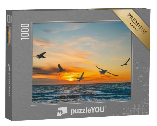 Puzzel 1000 stukjes „Meeuwen vliegen in de zonsondergang over zee“