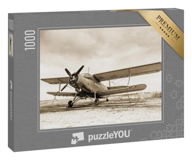 Puzzle 1000 Teile „Altes Flugzeug auf dem Rollfeld, sepia“