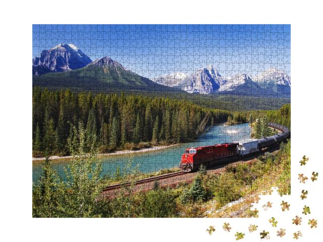 Puzzle 1000 Teile „Zugfahrt durch das Bow-Tal der mächtigen Rocky Mountains“
