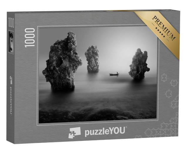 Puzzel 1000 stukjes „Eenzame visser tussen zee rotsen“