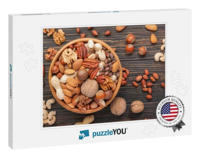 Assortment of Nuts in Bowls. Cashews, Hazelnuts, Walnuts... Jigsaw Puzzle