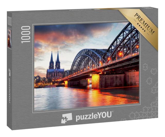 Puzzle 1000 Teile „Kölner Dom und Hohenzollernbrücke im Sonnenuntergang“