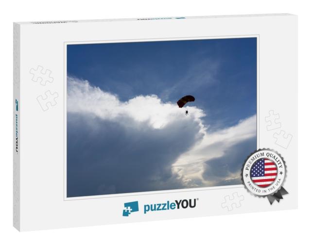 Beautiful Sky & Clouds with the Silhouette of a Skydiver... Jigsaw Puzzle