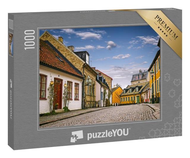 Puzzle 1000 Teile „Straße mit alten Gebäuden, Innenstadt von Lund, Schweden“