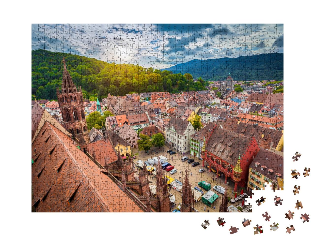 Puzzle 1000 Teile „Historisches Zentrum von Freiburg aus der Luft, Münster im Abendlicht“