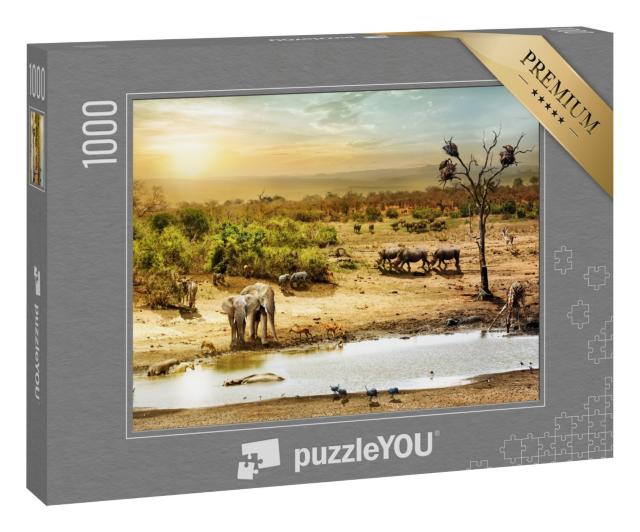 Puzzle 1000 Teile „Tiere am Wasserloch im Sonnenuntergang südafrikanische Wüste“