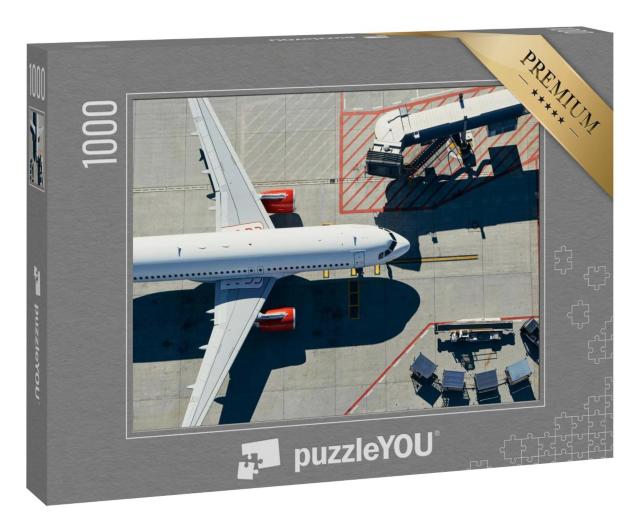 Puzzle 1000 Teile „Blick aus der Vogelperspektive: Flugzeug am Gate des Terminals“
