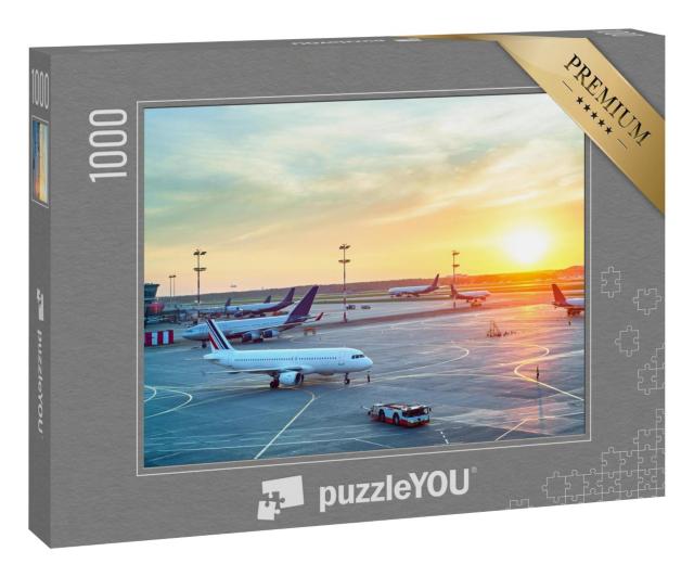 Puzzle 1000 Teile „Flughafen in schönem Sonnenuntergang“