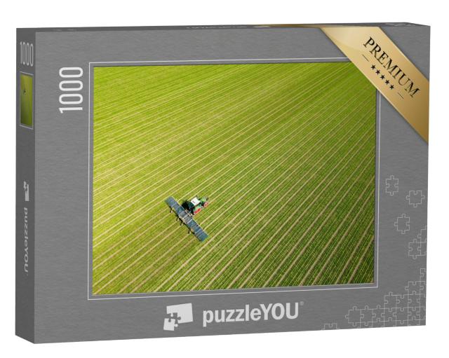 Puzzel 1000 stukjes „Luchtfoto van een boer aan het werk op zijn land, Flevoland“